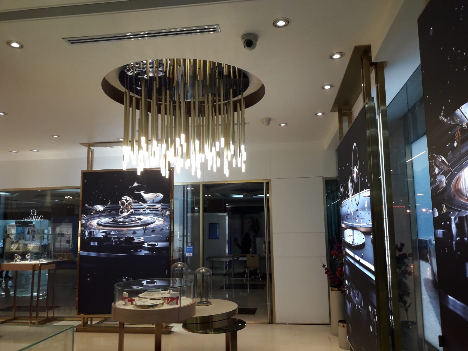 A watch movement being assembled by a watchmaker.